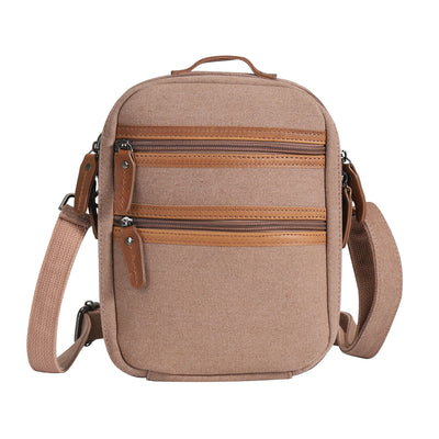 Lightweight concealed carry sling, Jax canvas crossbody with built-in mag storage and phone slot