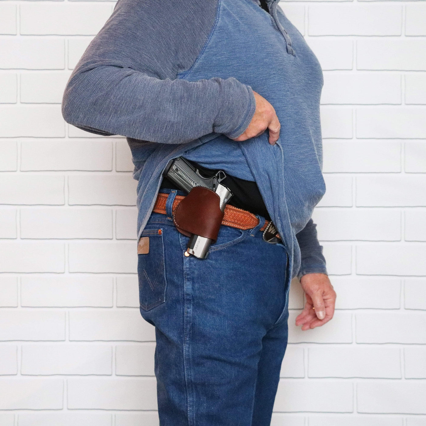 Unisex Compact Leather Clip-on Gun Holster by High Caliber Gun Accessories